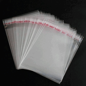 FUNDA PLASTICA ADHESIVA - 100 UNDS